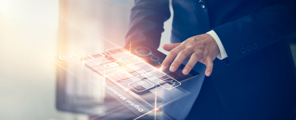 Business Man holding a high tech digital tablet with Data Analytics